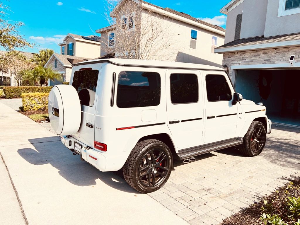 White Mercedes G-Class with tinted windows
