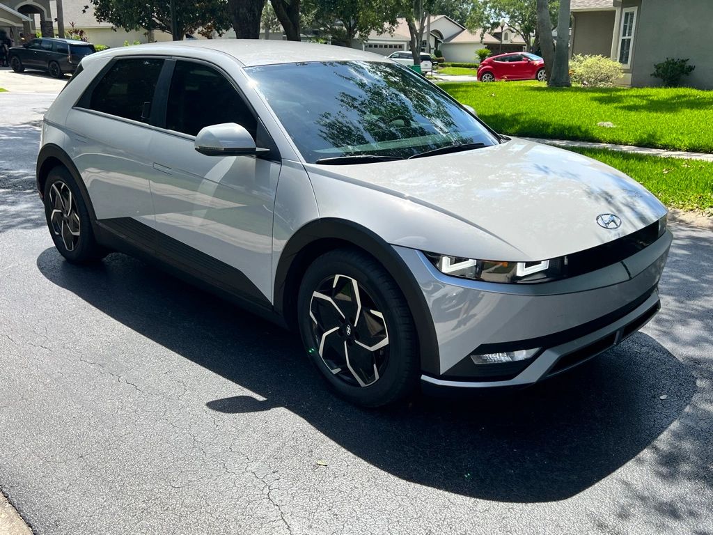 White Hyundai Ioniq 5 with tinted windows